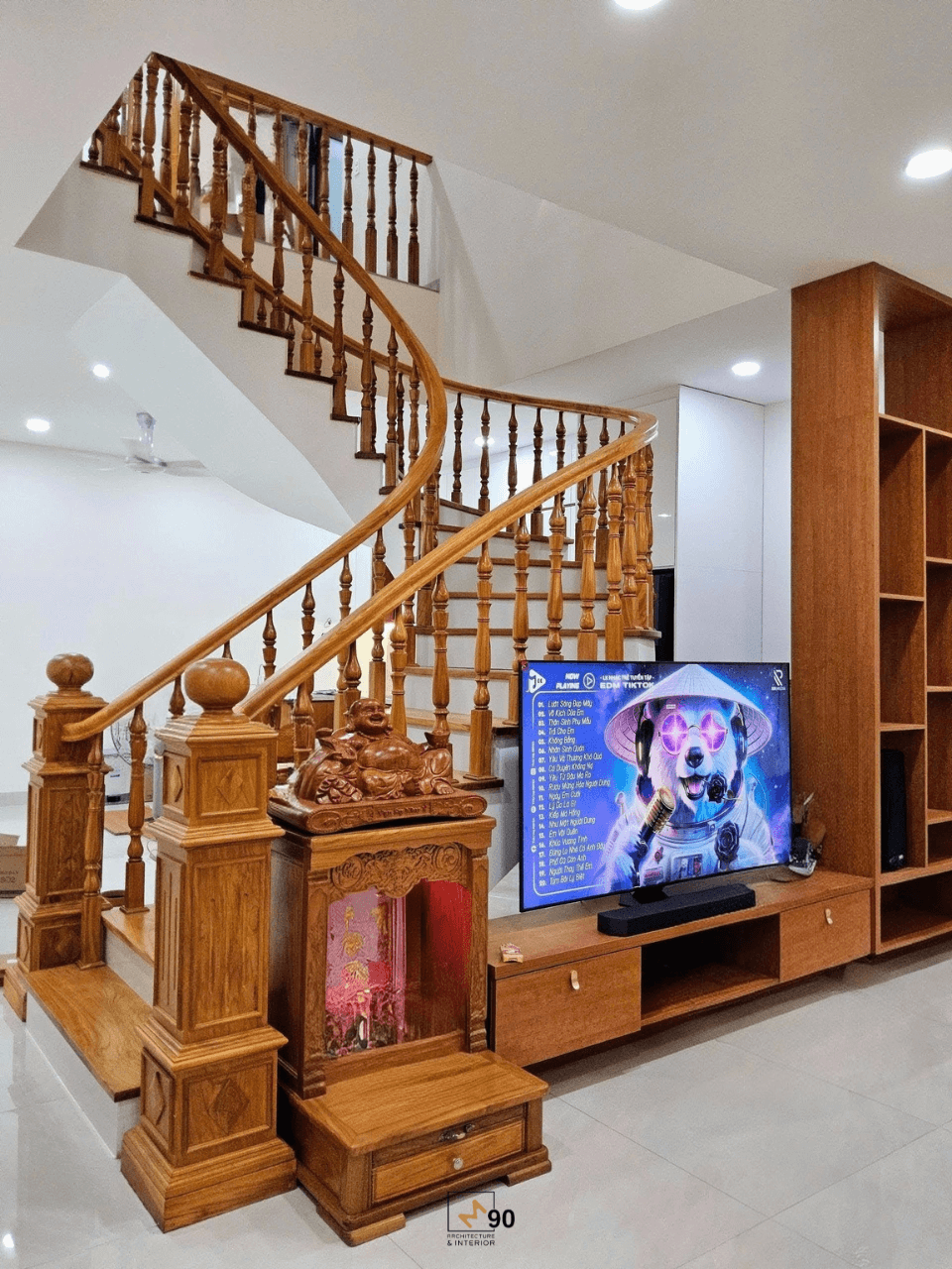 Bộ cầu thang gỗ đẹp hiện đại được làm từ gỗ tự nhiên nguyên khối do xưởng sản xuất nội thất công ty M90 thi công.
